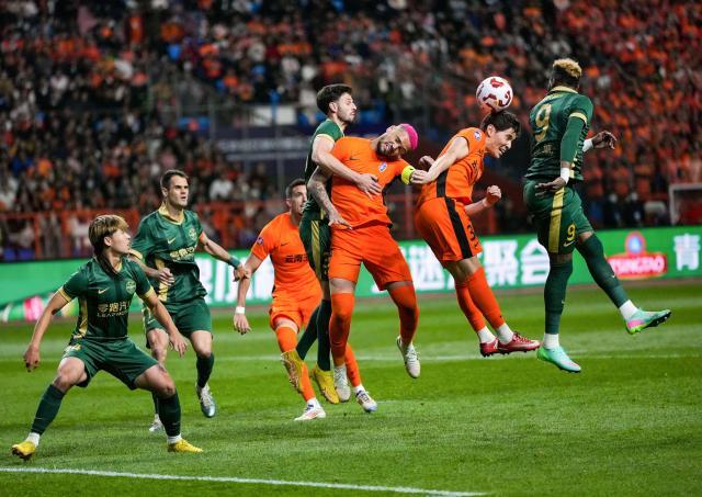 PG官方平台-单国脚对抗四国脚 玉昆取中超第一分如释重负